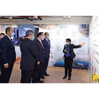 Director Xia Baolong visita fracções modelos de apartamentos de habitação pública