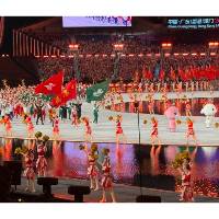 澳门理工大学学生及毕业生担任十五运会开幕式澳门体育代表团持旗手、教练员代表宣誓、火炬传递和点燃主火炬