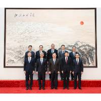 夏寶龍在京會見戴建業一行